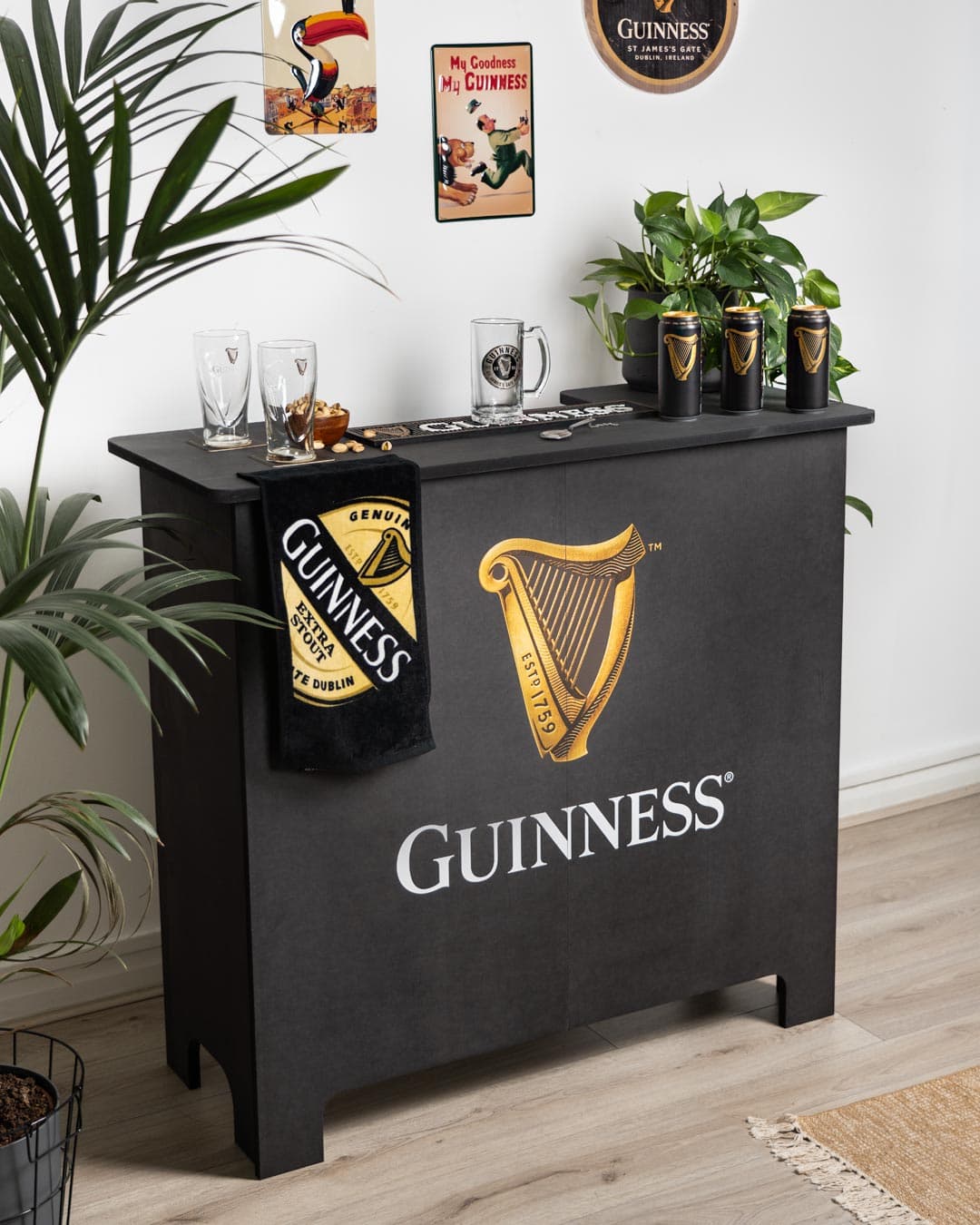 Guinness home bar with Guinness merchandise