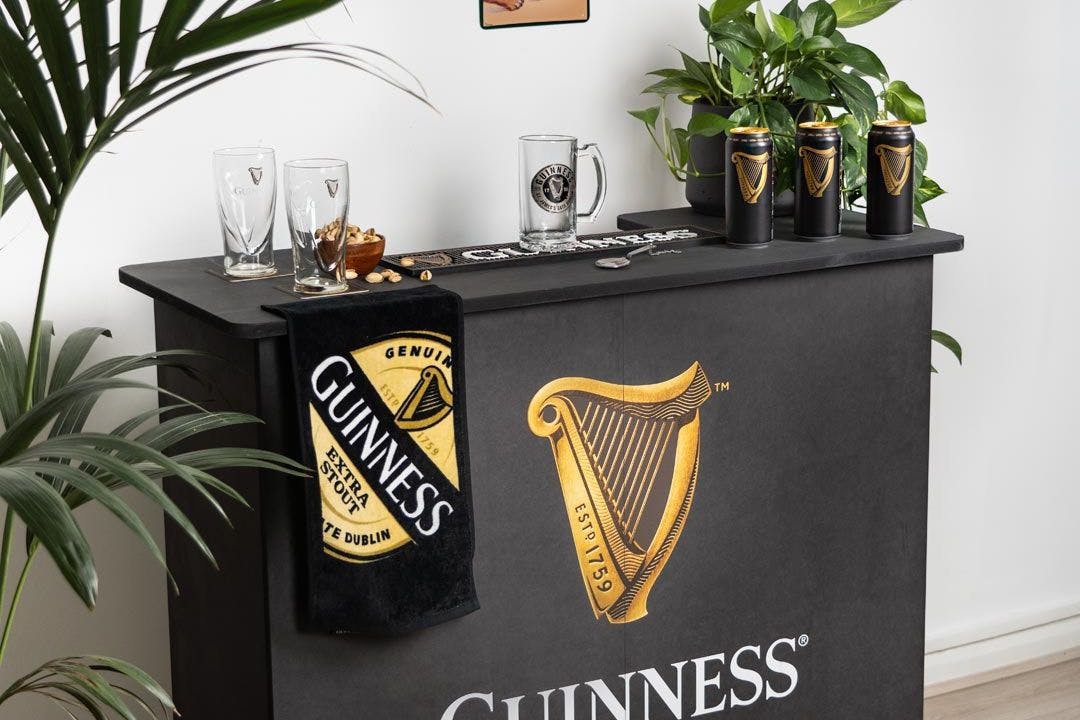 Guinness home bar with Guinness merchandise