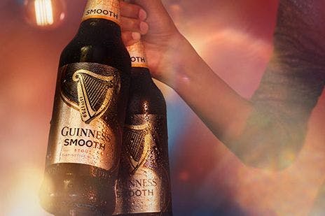 2 Bottles of Guinness Smooth in bucket of ice