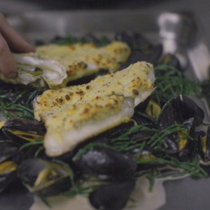 white fish and mussels with samphire