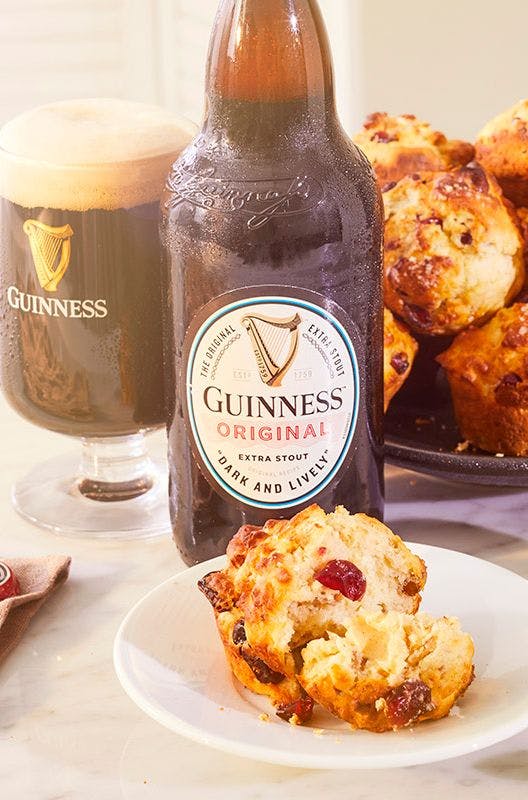 Bottle of Guinness and fruit scones