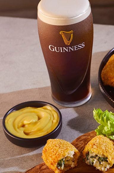 potato croquettes with a pint of Guinness