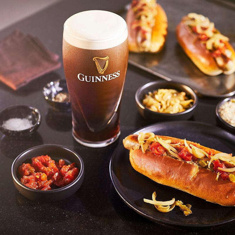 Pint of Guinness and a hotdog - main