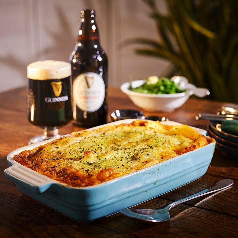 Bottle of Guinness with Shepards pie