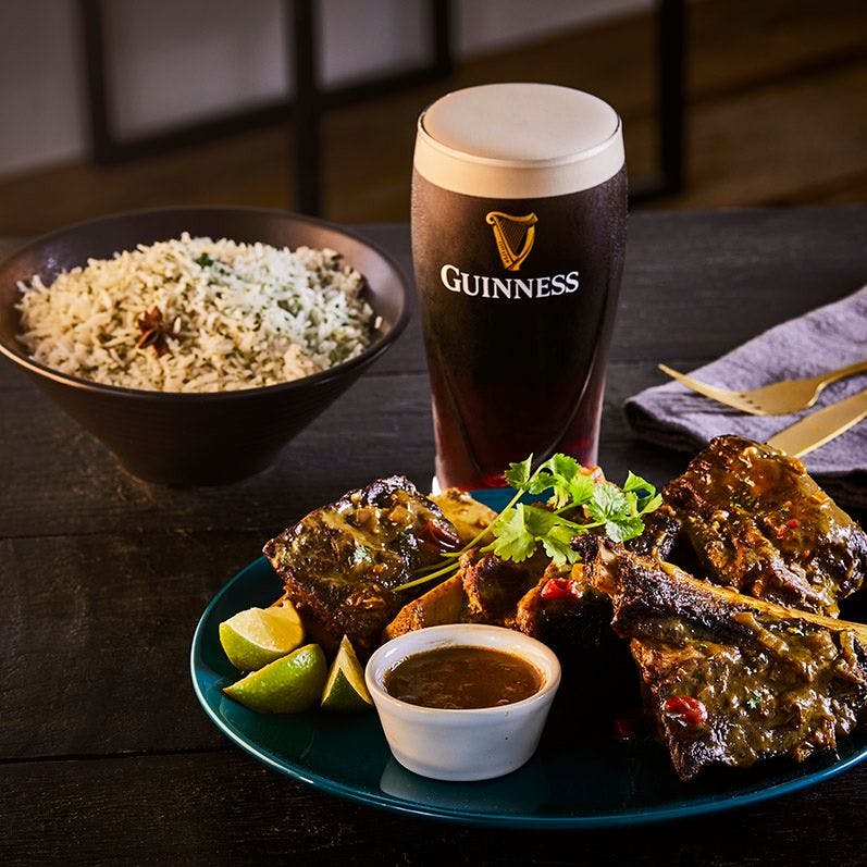 braised short ribs with rice and a pint of Guinness