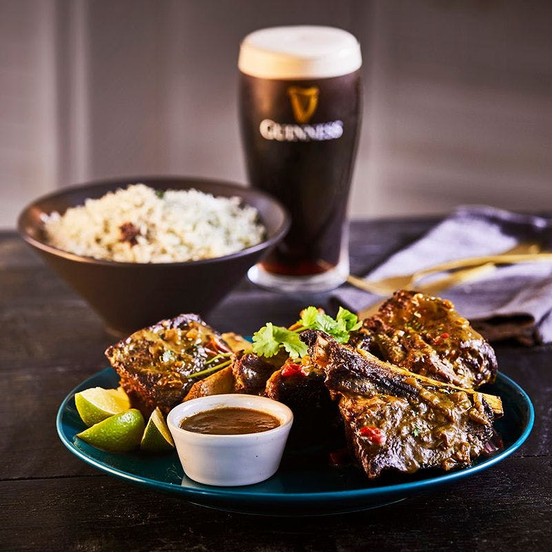braised short ribs with rice and a pint of Guinness