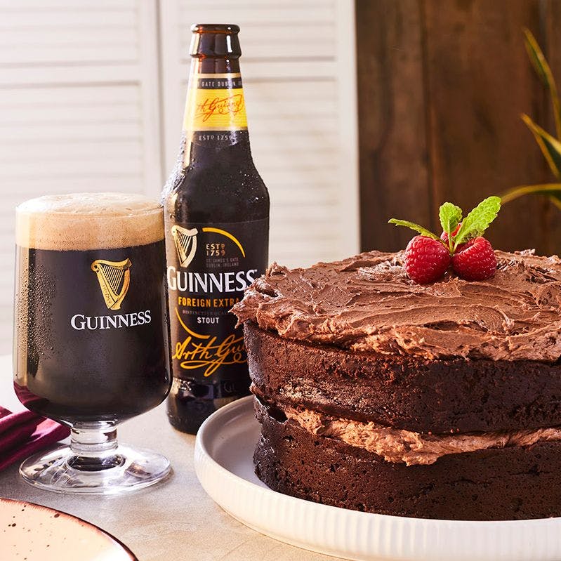 Bottle of Guinness served with a Guinness chocolate cake - media