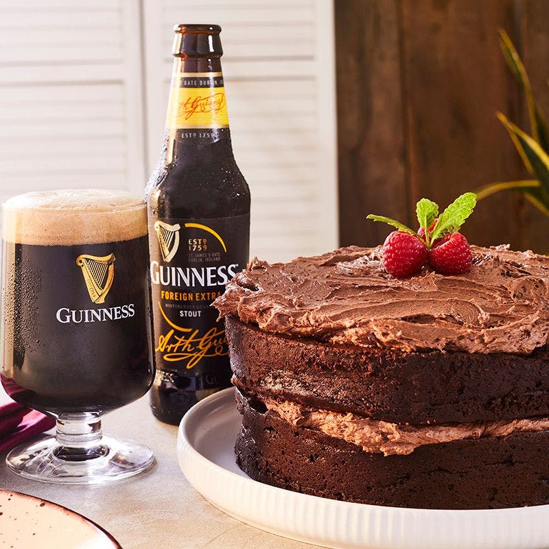 Bottle of Guinness served with a Guinness chocolate cake